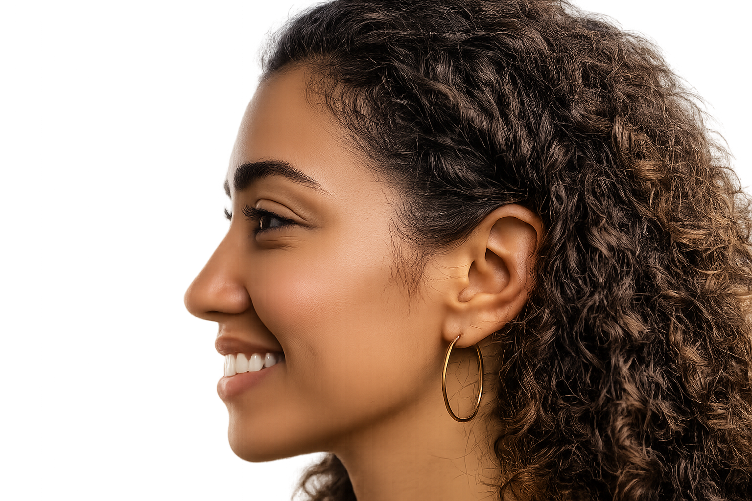 A smiling woman in side profile, looking ahead with calm focus